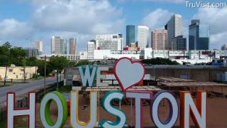 We Love Houston Sign - Reveal shot overlooking the Houston skyline (15 sec)